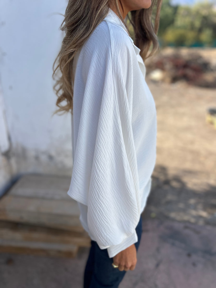 Blusa larga con botones